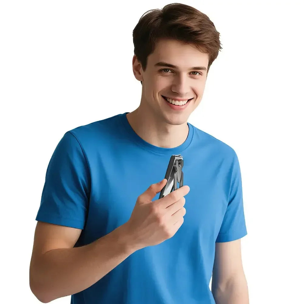 Smiling man holding stainless steel nail clippers in hand, wearing blue shirt, white background